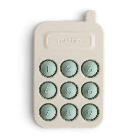 Mushie Press Toy